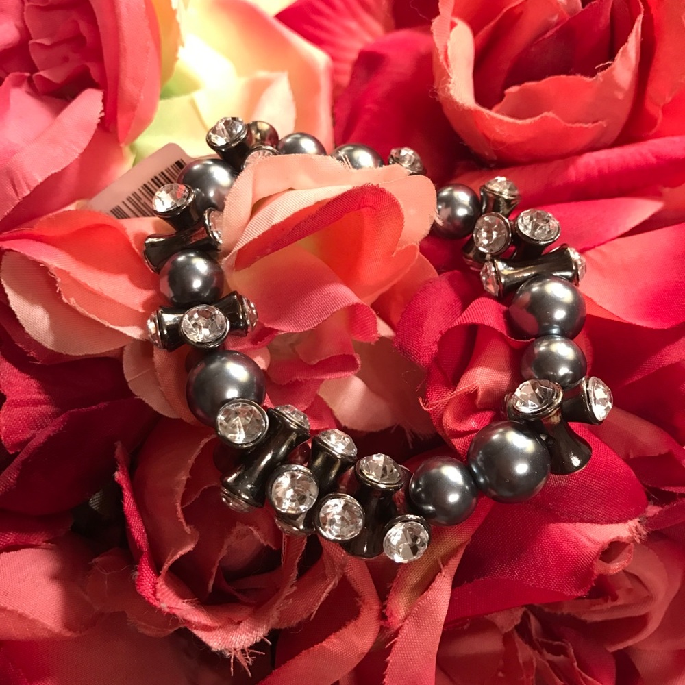 Silver / gray with light gemstones